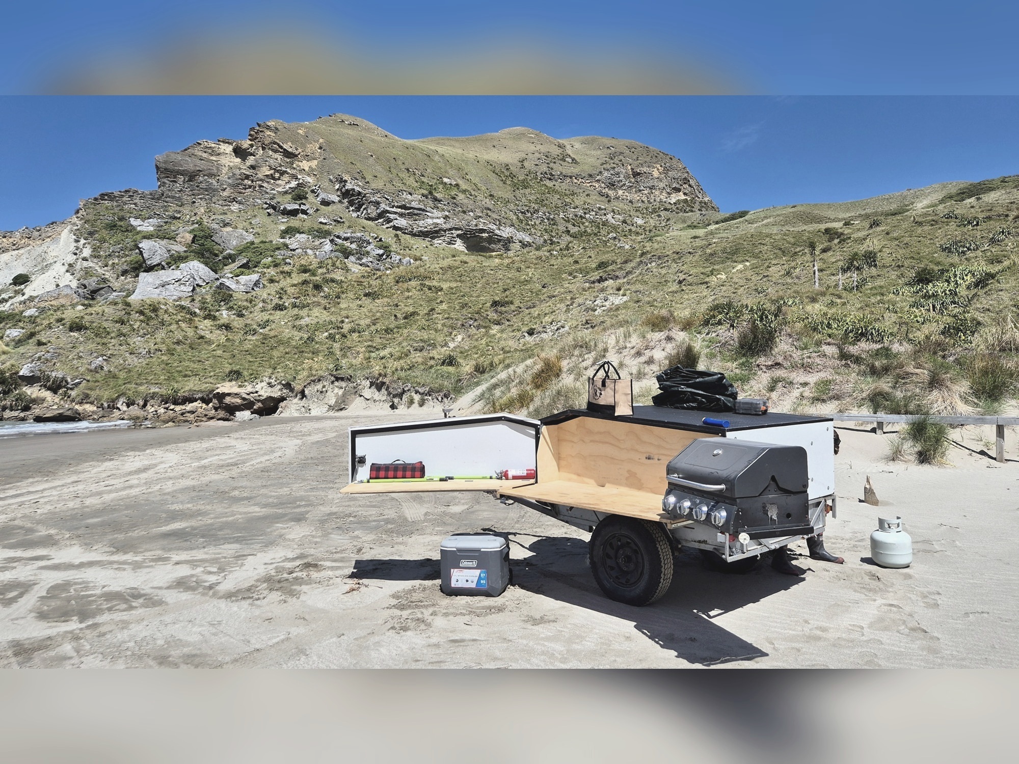 BBQ trailer set up at the beach