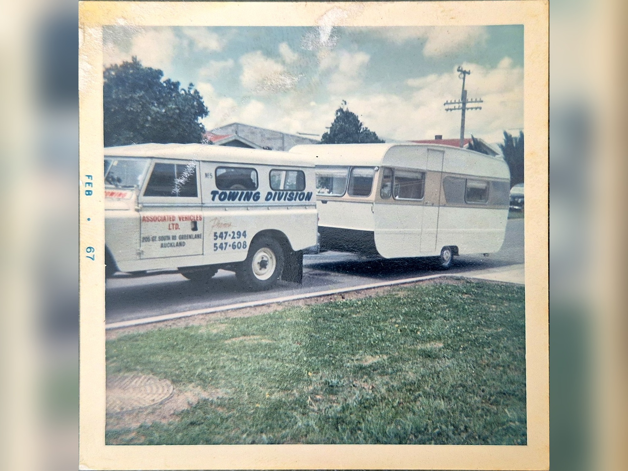 Historic towing vehicle and caravan photograph